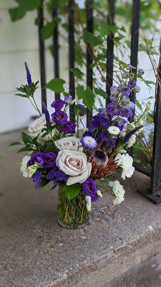 The Danielle
Shades of purple for the purple lover in your life. Other complimentary colors may be included to enhance the arrangement.Please include flower preferences. Some flowers may not be available for same day orders.
Flower arrangement
FloralsbyHeidiCatherine